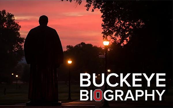 Thompson statue on the Oval silhouetted at sunset